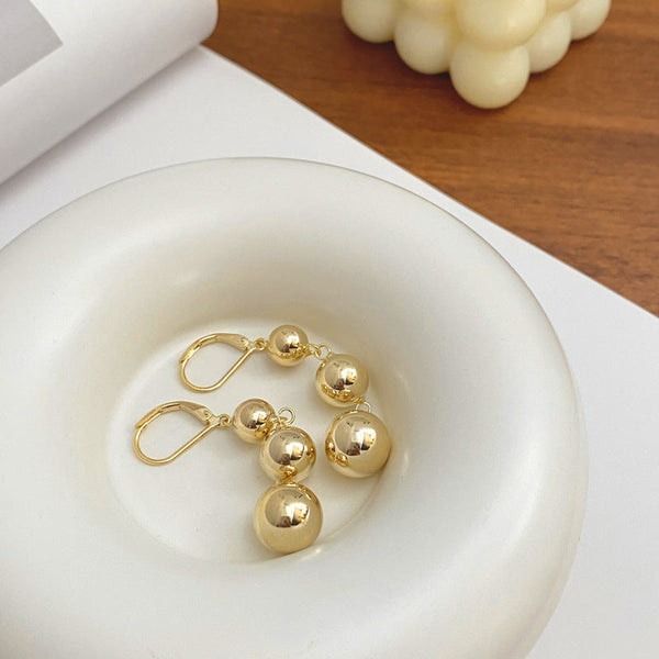 European and American metal style round bead tassel earrings temperament niche cool trend high-end earrings for women